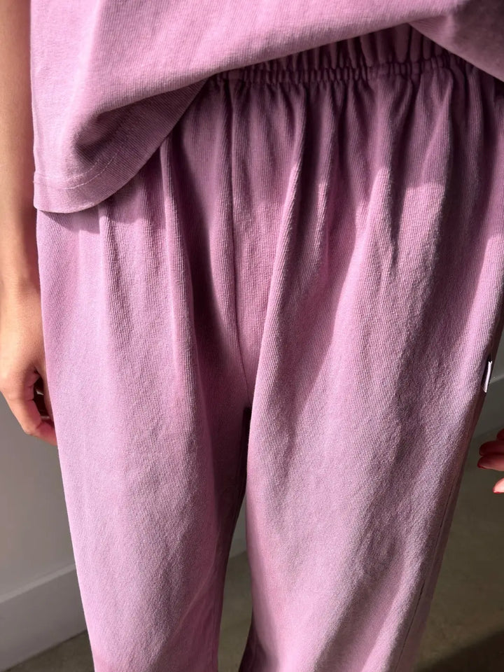 A close-up shot focusing on the textured fabric and elasticized waist of the Le Bon Shoppe Balloon Pants in Dusty Lilac | Twentyseven