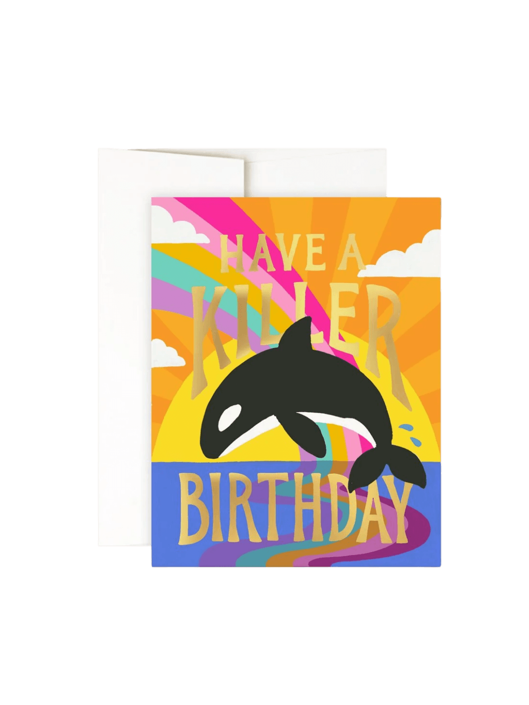 A studio product shot of the Idlewild Co. Birthday Greeting Card in Killer Birthday featuring an orca whale leaping in front of a colorful sunset with gold foil lettering, set against a plain white envelope | Twentyseven