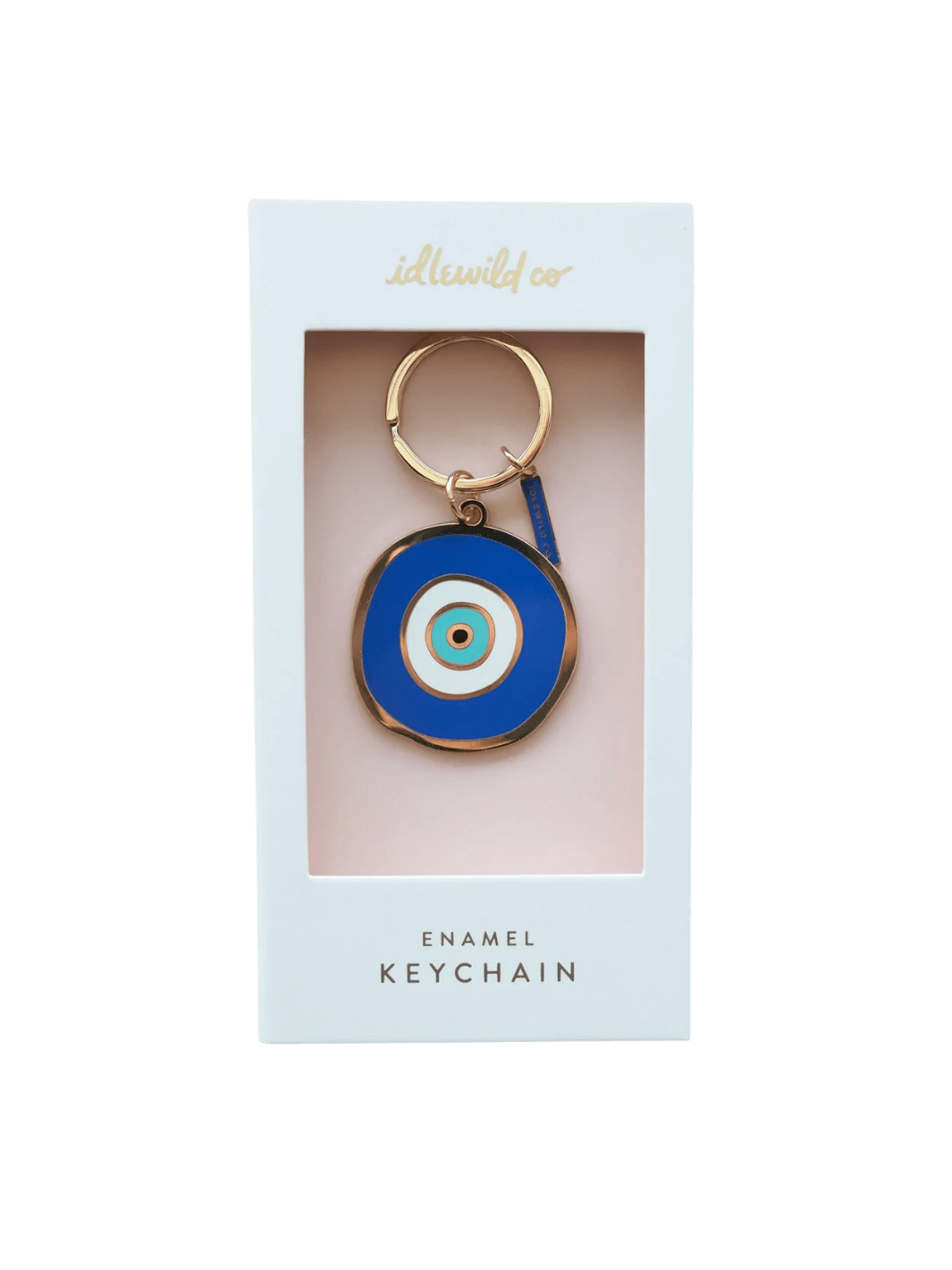 A front-facing studio shot of the Idlewild Co. Evil Eye Enamel Keychain in its original white display packaging | Twentyseven