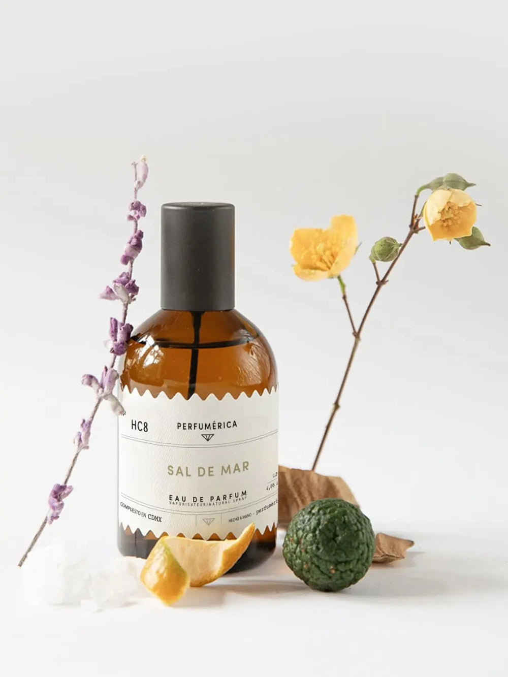 Brown perfume bottle with a black cap, the fragrance 'HC8 Sea Salt Eau de Parfum' from Perfumérica, 120ml, with natural ingredients on a white background | Twentyseven Toronto