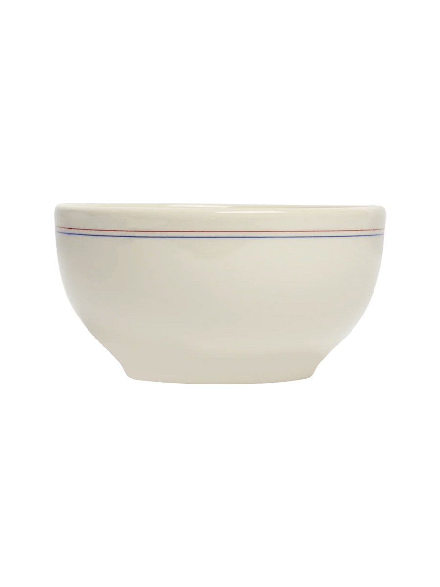 Side profile view of an off-white HL Red/Blueband - Cereal Bowl (22oz) from Fishs Eddy, highlighting its rounded silhouette, tapered base, and horizontal red and blue stripes | Twentyseven Toronto