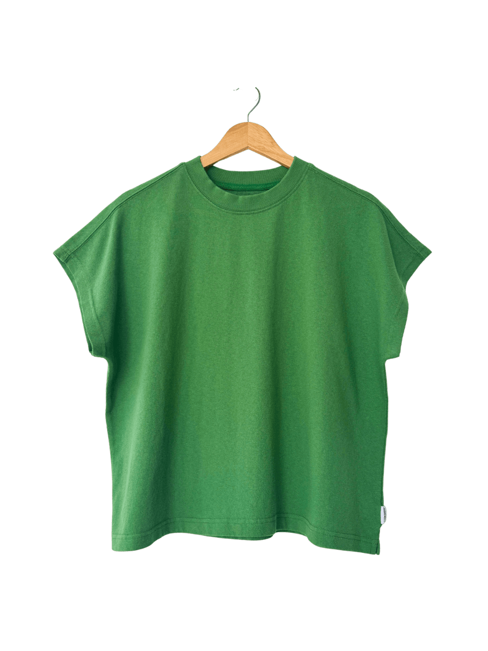 A studio product shot of the short-sleeve Le Bon Shoppe Jeanne Tee in Asparagus hanging on a wooden hanger | Twentyseven