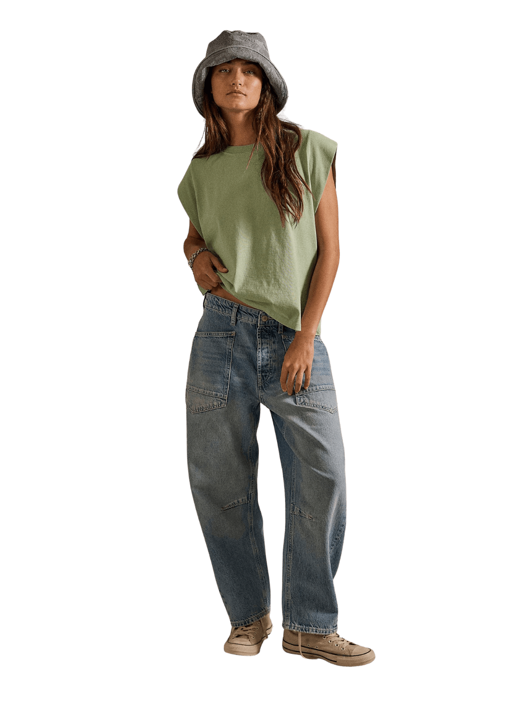 Full-length front studio view of a model styled in a bucket hat, green sleeveless tee, and the Free People We the Free Minimalist Moxie Barrel Jeans in County Fair | Twentyseven