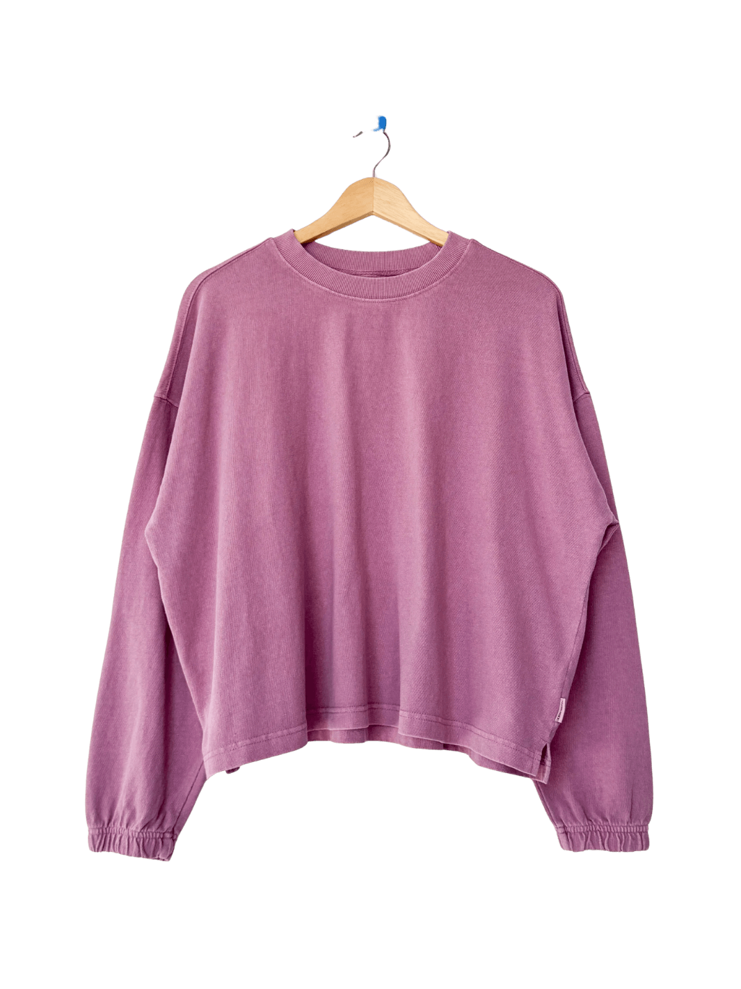 A studio product shot of the long-sleeve Le Bon Shoppe Naturelle Tee in Dusty Lilac on a wooden hanger | Twentyseven