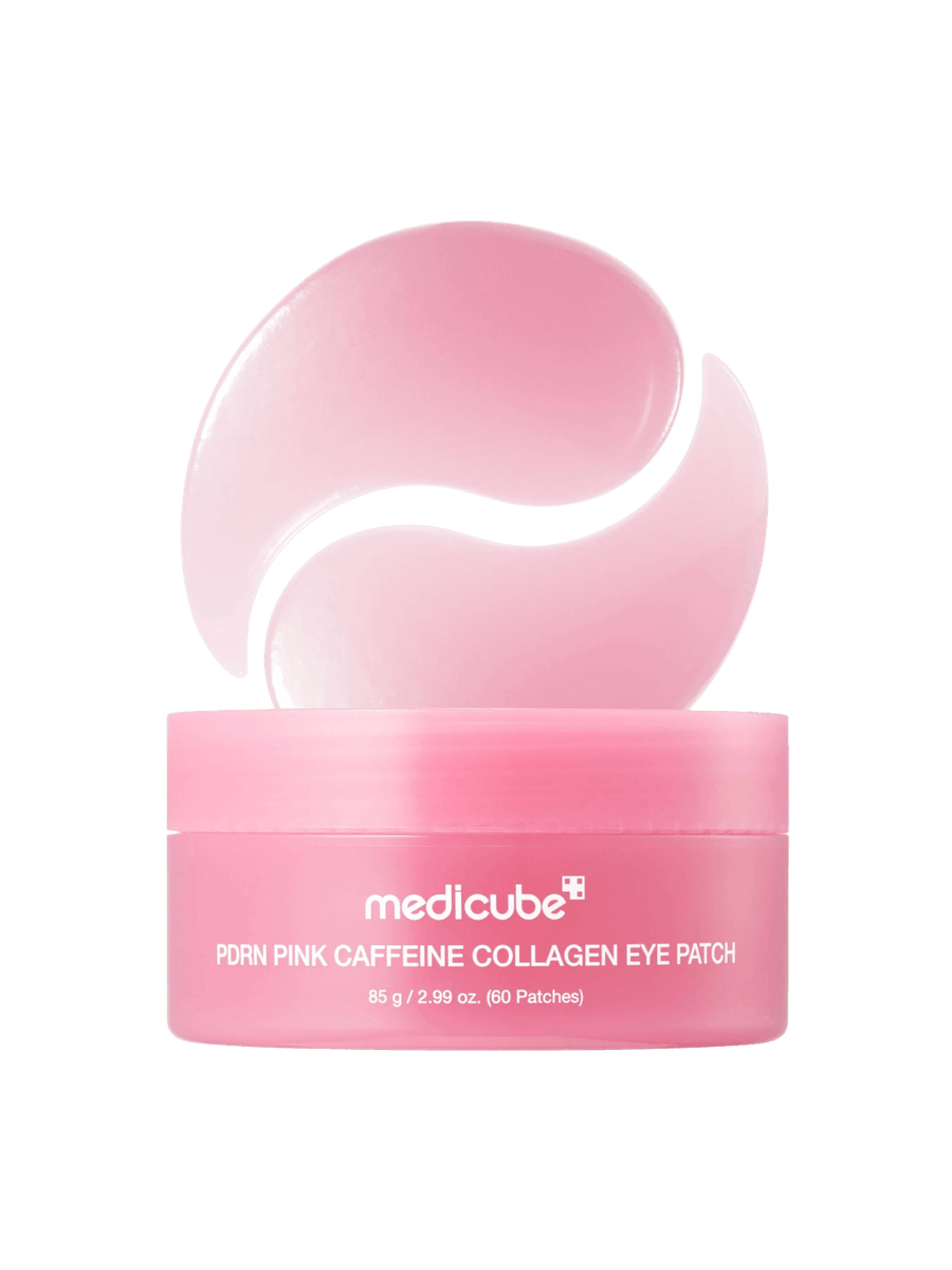 A studio product shot of the pink Medicube PDRN Caffeine Collagen Eye Patch jar displayed with two gel patches forming a crescent shape above it | Twentyseven