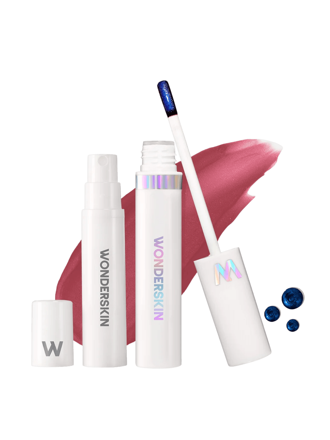 Studio product shot of the Wonderskin WONDER BLADING Peel & Reveal Lip Color Kit in Charming featuring the activator spray, lip stain tube, applicator wand, and a deep rose lip swatch | Twentyseven