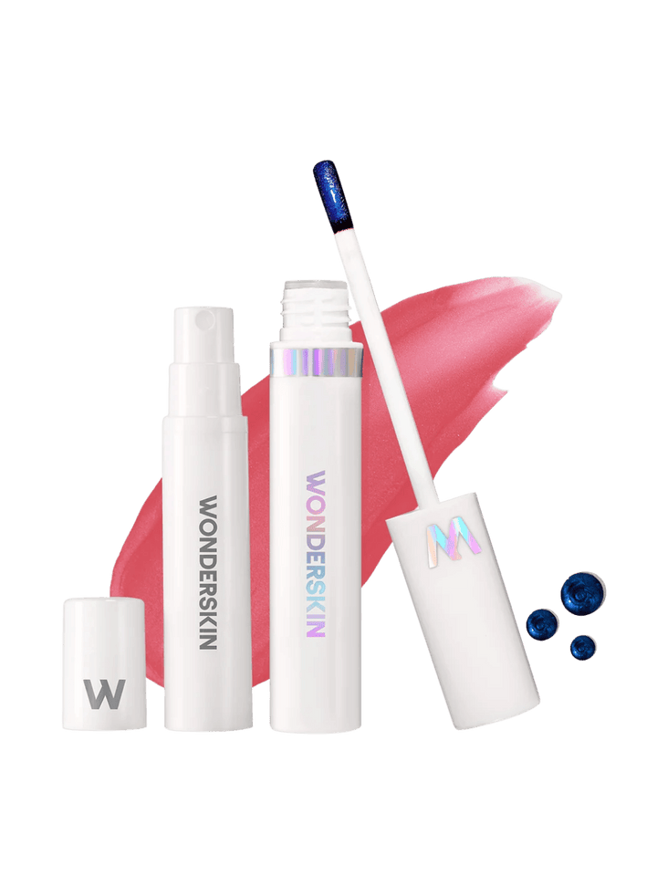 Product shot featuring the Wonderskin WONDER BLADING Peel & Reveal Lip Color Kit - Romance white spray bottle, lip stain tube, applicator wand with metallic blue gel, and a pink lip swatch background | Twentyseven
