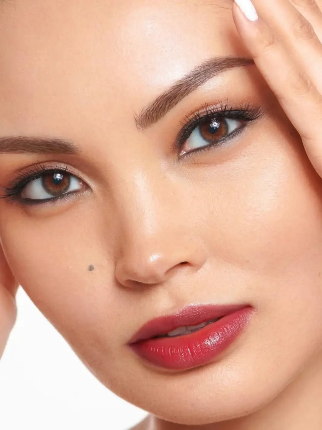 Close-up portrait of a woman wearing the berry-toned shade of the Wonderskin WONDER BLADING Peel & Reveal Lip Color Kit in Whimsical | Twentyseven