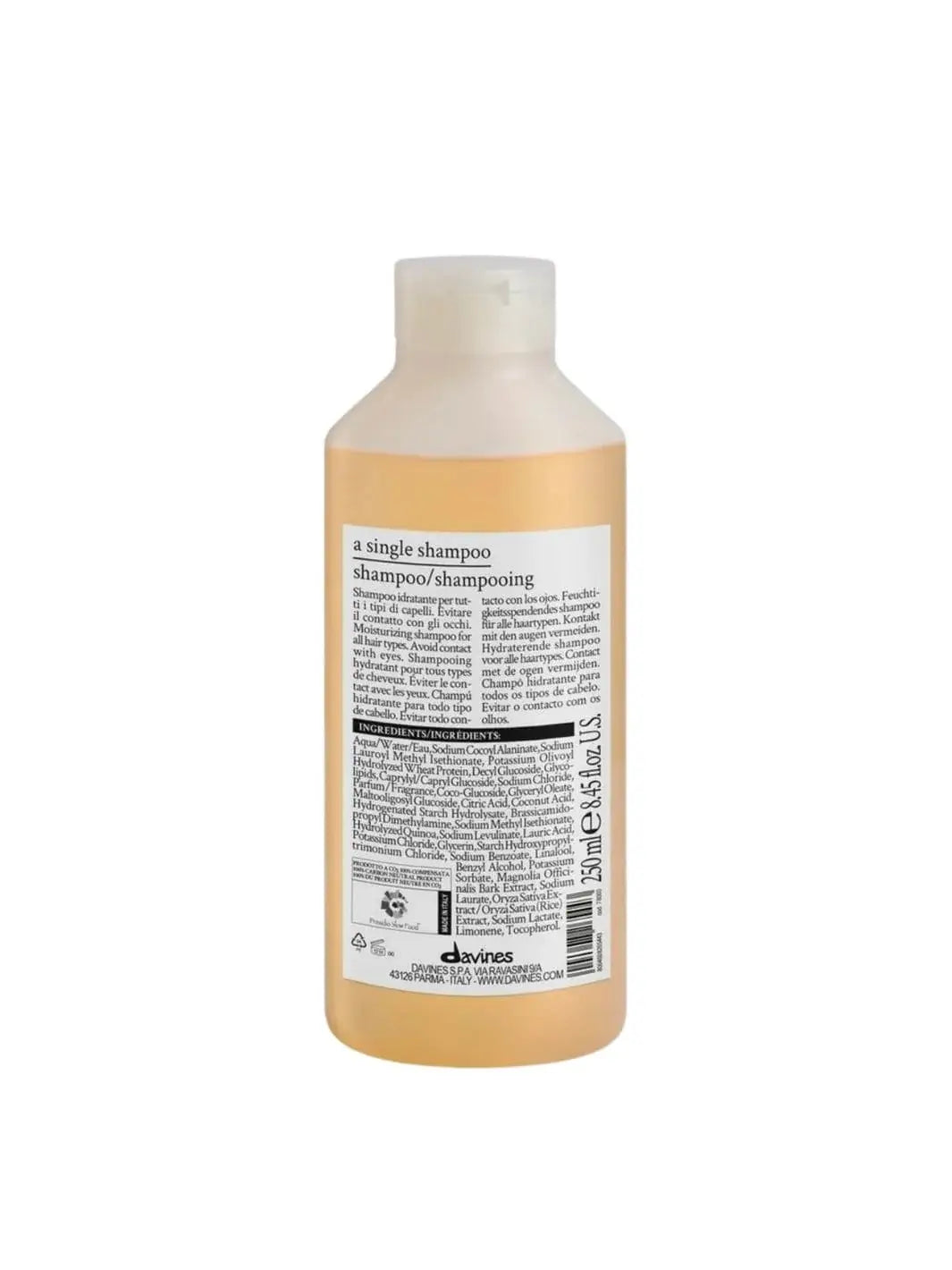 The back label of a Davines A Single Shampoo bottle is displayed clearly against a white background, showing the product description and ingredients list | Twentyseven Toronto