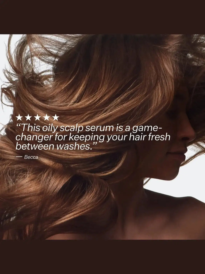 Close-up of a person with long, wavy hair, featuring a product review quote on Act+Acre Oil Control Pro System | Twentyseven Toronto