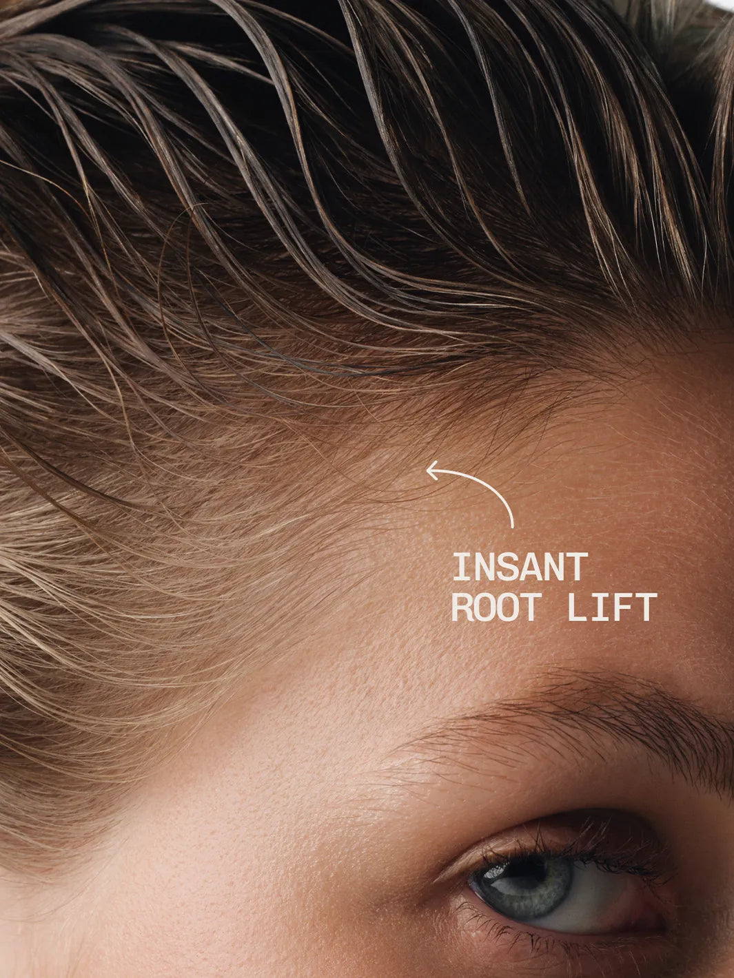 Close-up of hair styled with Act+Acre Stem Cell Thickening Foam highlighting instant lift and volume at the roots | Twentyseven Toronto