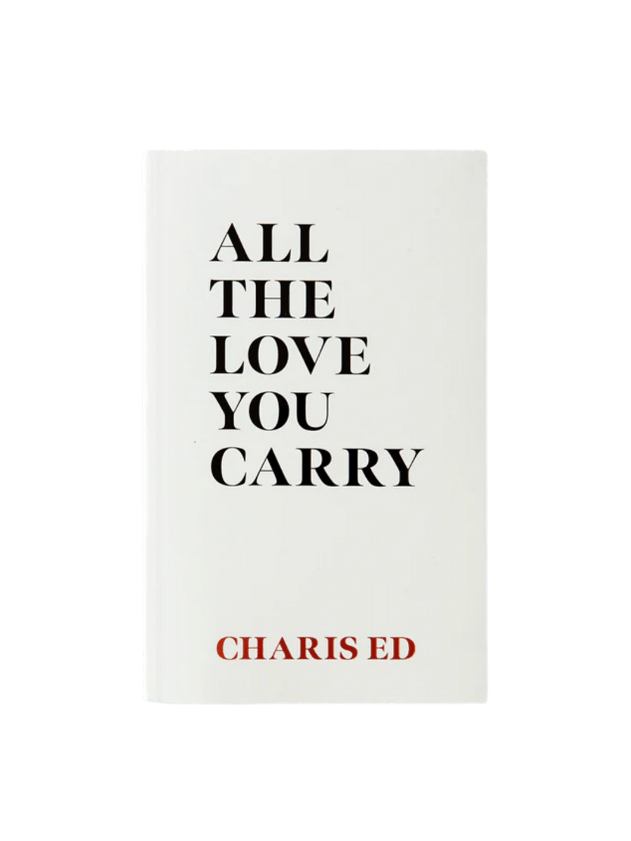 The front cover of All The Love You Carry by Charis Ed features a minimalist design with bold, black typography for the title and the author's name printed in red at the bottom | Twentyseven Toronto