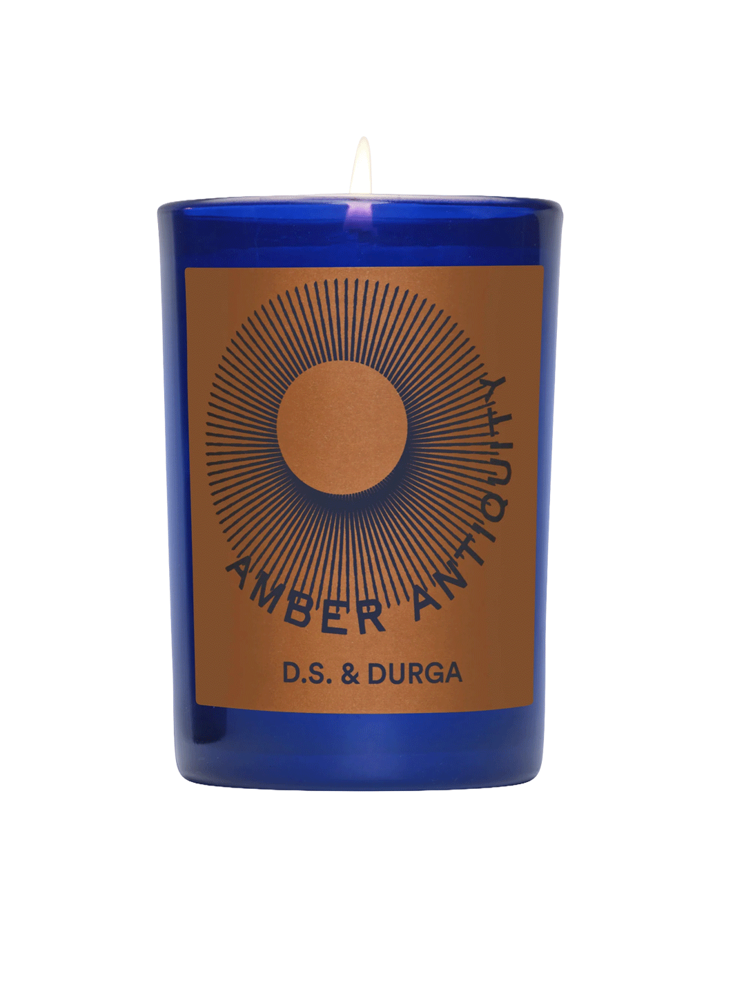 D.S. & Durga Amber Antiquity Candle in a cobalt blue glass vessel with amber and navy graphic label | Twentyseven Toronto