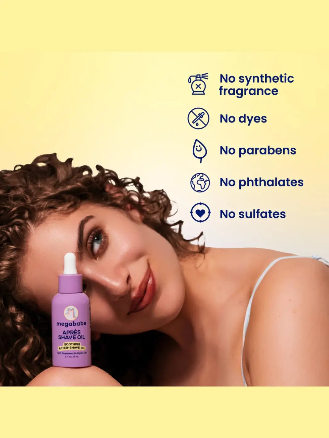 Woman with a bottle of Megababe Apres Shave Oil on a yellow background with product benefits listed | Twentyseven Toronto