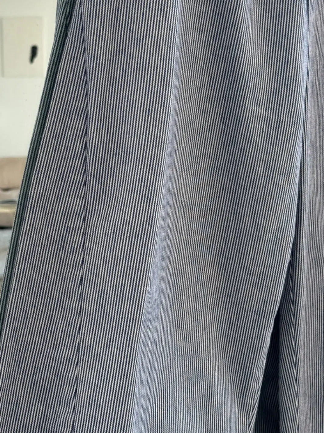 A detailed close up view highlights the vertical stitch lines and texture of the fabric on the Le Bon Shoppe Arc Pants - Blue Stripe | Twentyseven Toronto