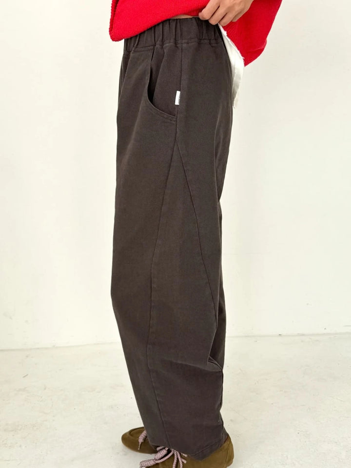 Brown Arc Pants in 'Umber' from Le Bon Shoppe worn by a person, side view | Twentyseven Toronto
