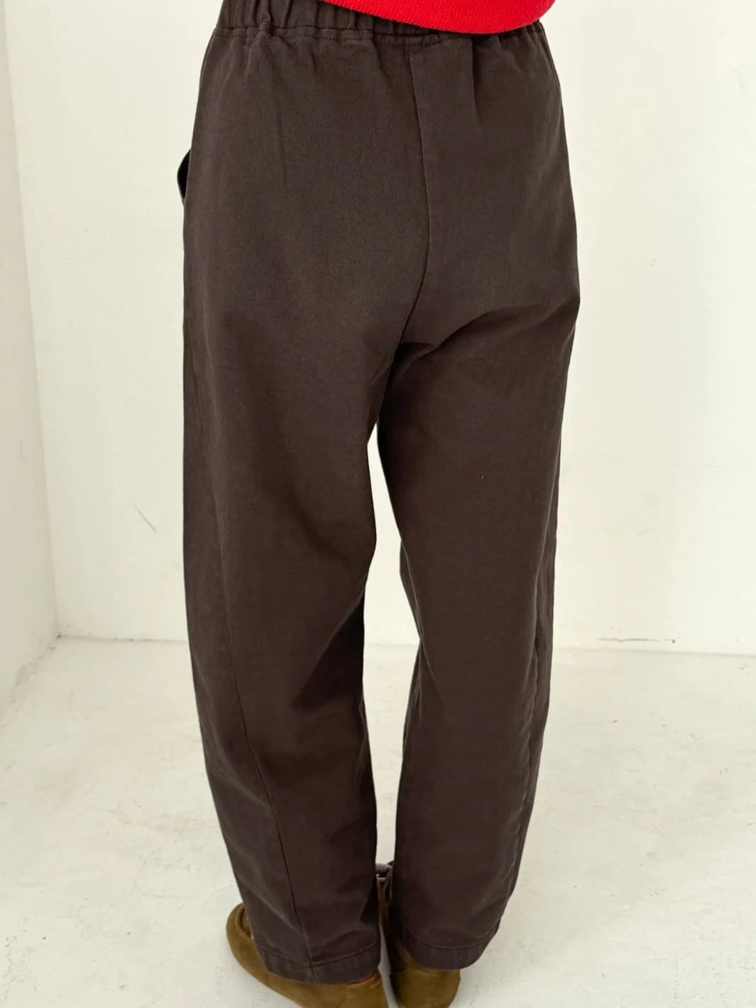 Brown Arc Pants in 'Umber' from Le Bon Shoppe worn by a person, back view | Twentyseven Toronto