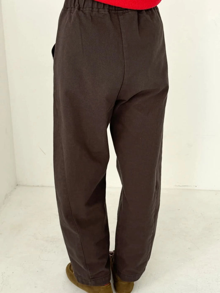 Brown Arc Pants in 'Umber' from Le Bon Shoppe worn by a person, back view | Twentyseven Toronto