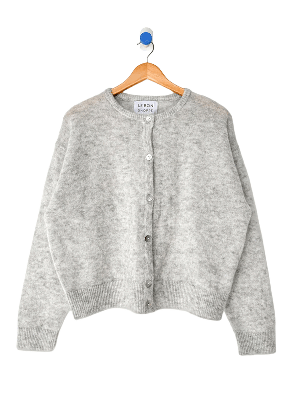 Le Bon Shoppe Ayla Mohair Cardigan in Heather Grey displayed on a wooden hanger, featuring a crew neckline and shell button front | Twentyseven Toronto