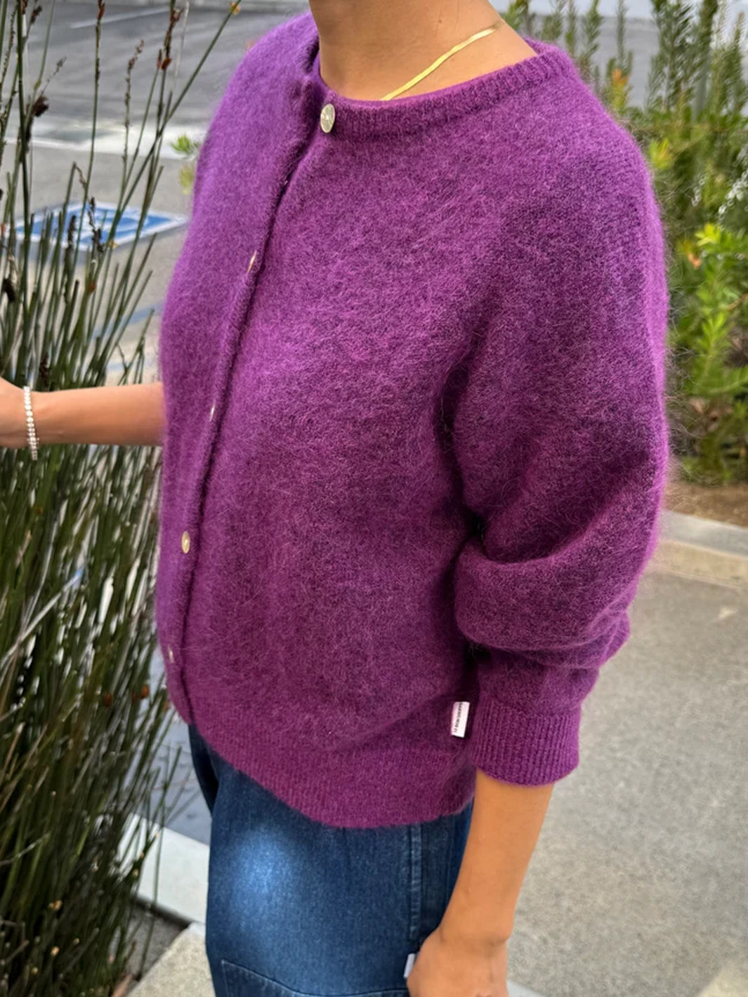 Le Bon Shoppe Ayla Mohair Cardigan in purple shown from the side, highlighting its relaxed fit and soft mohair texture | Twentyseven Toronto