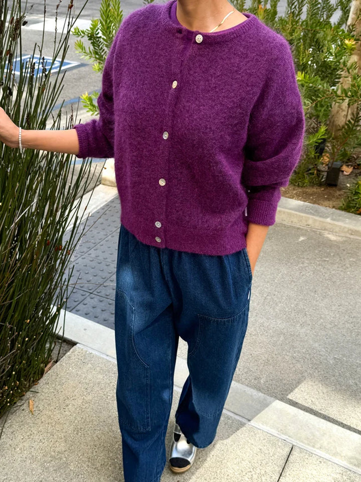 Le Bon Shoppe Ayla Mohair Cardigan in purple styled with relaxed blue denim, showing the cardigan’s easy silhouette and crew neckline | Twentyseven Toronto