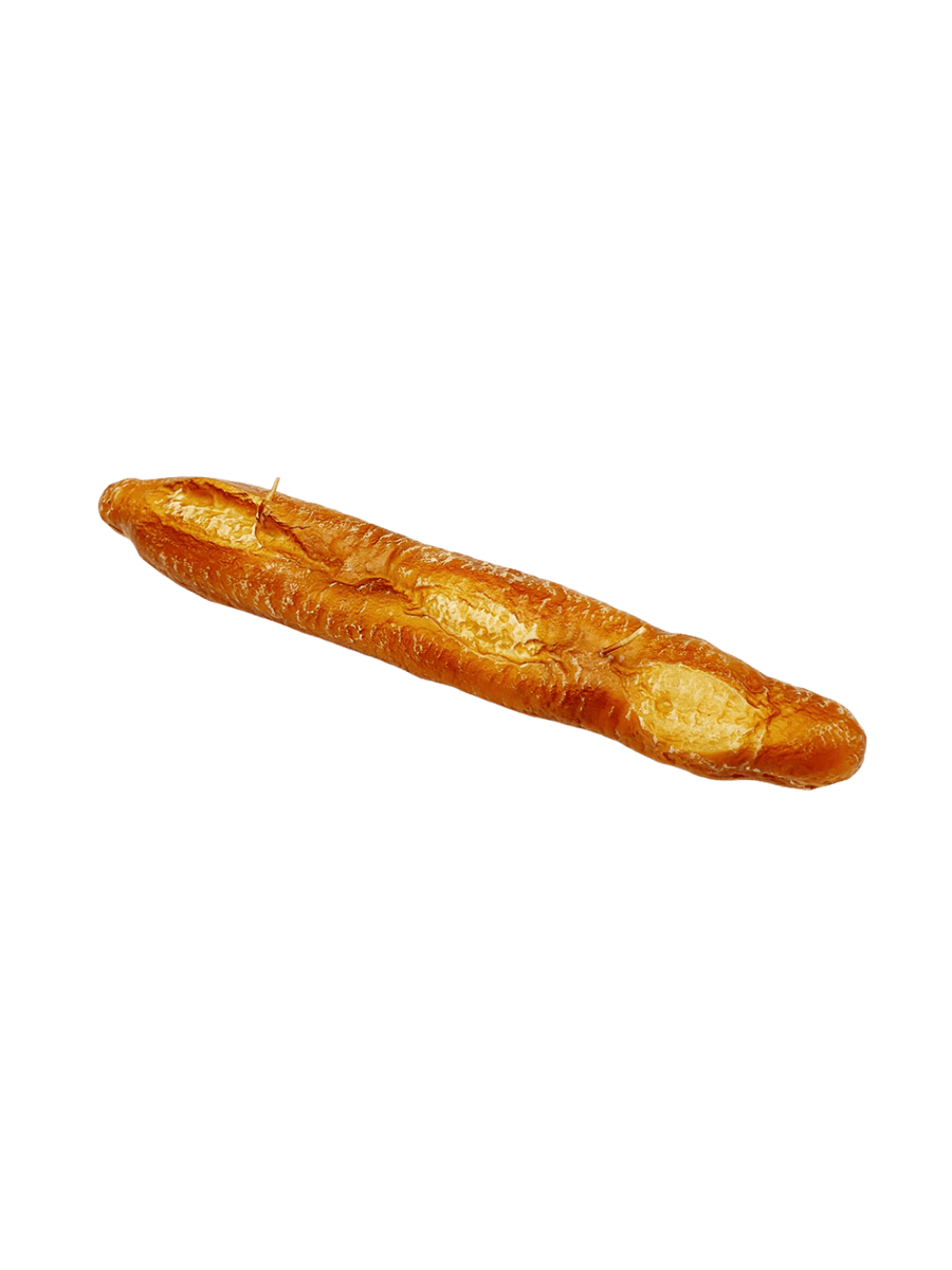 Baguette shaped candle from Cereria Introna on a transparent background | Twentyseven Toronto