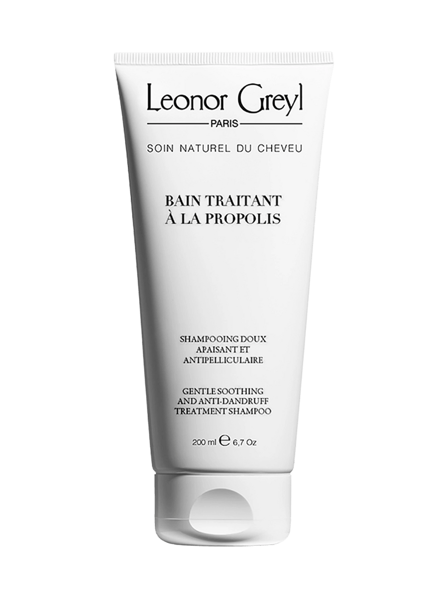 Leonor Greyl 'Bain Traitant à la Propolis' shampoo bottle on a transparent background | Twentyseven Toronto