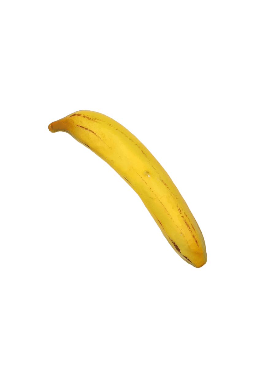 Yellow banana shaped candle from Cereria Introna on a transparent background | Twentyseven Toronto