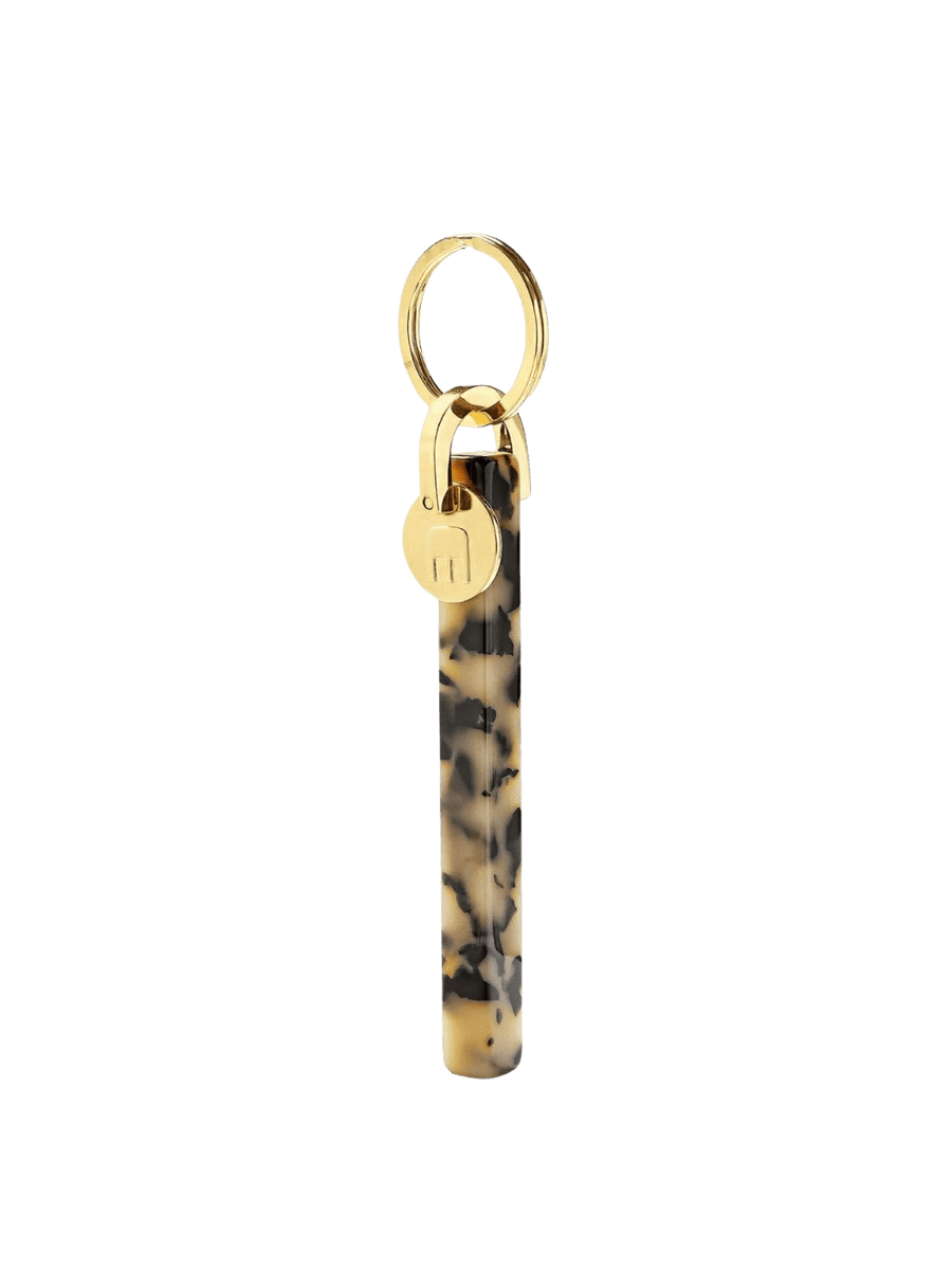 Keychain with tortoiseshell design and gold clasp from MACHETE | Twentyseven Toronto
