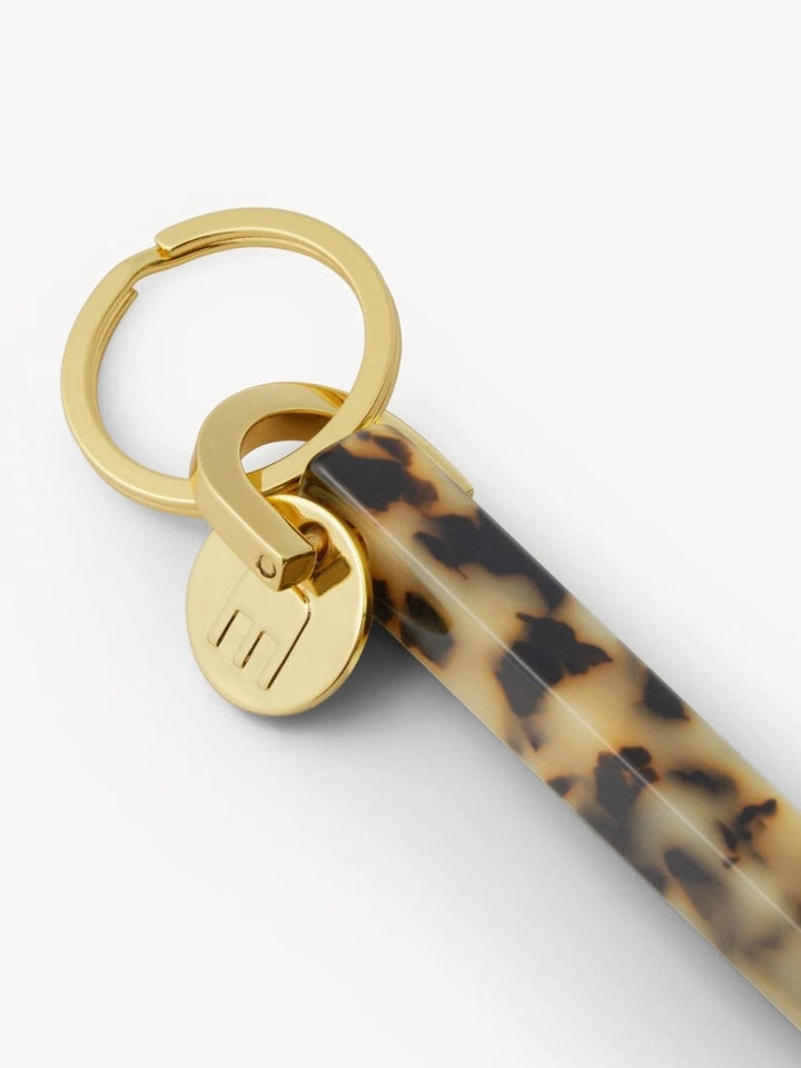 Keychain with tortoiseshell design and gold clasp from MACHETE | Twentyseven Toronto
