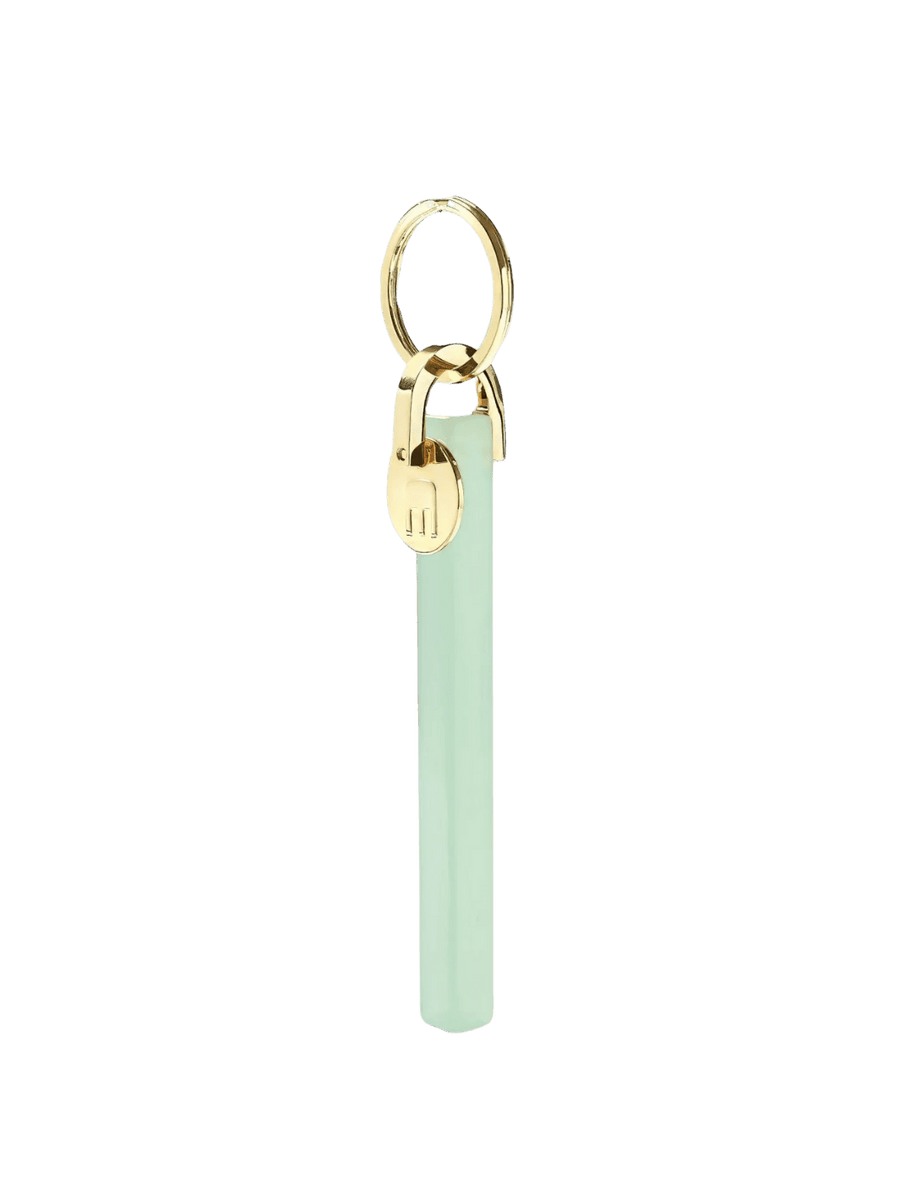 Gold and light green keychain from MACHETE | Twentyseven Toronto
