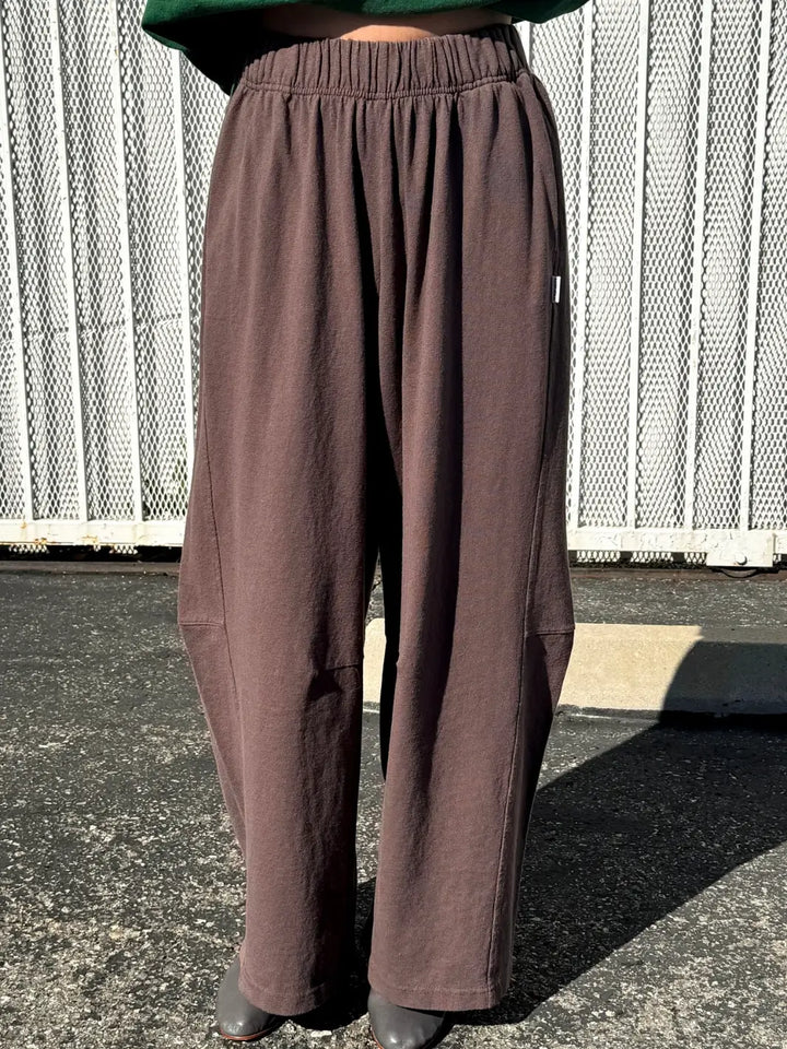 Person wearing dark brown wide-leg Bare Pants in 'Chocolate' from Le Bon Shoppe in an outdoor setting | Twentyseven Toronto