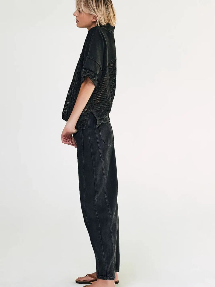 A full-length side view highlights the distinct barrel-leg silhouette of the Free People Good Luck Mid-Rise Barrel Jeans - Soundwave paired with brown sandals | Twentyseven Toronto
