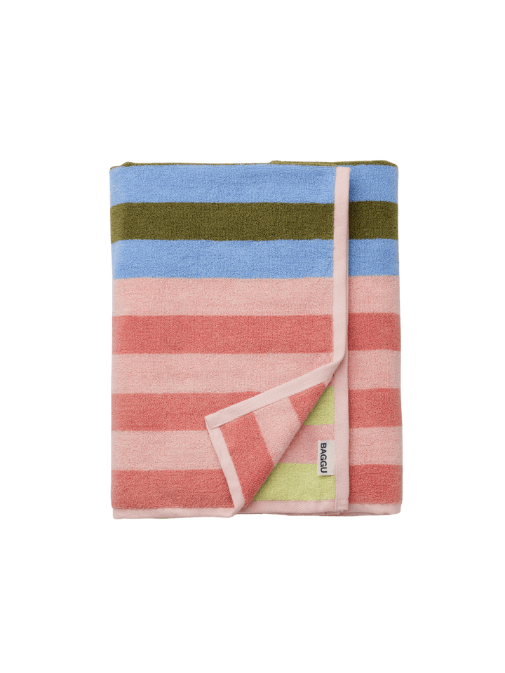Folded view of the Baggu Bath Towel in Sherbet Stripe featuring plush terrycloth texture and pink, blue, and olive green striped sections | Twentyseven Toronto