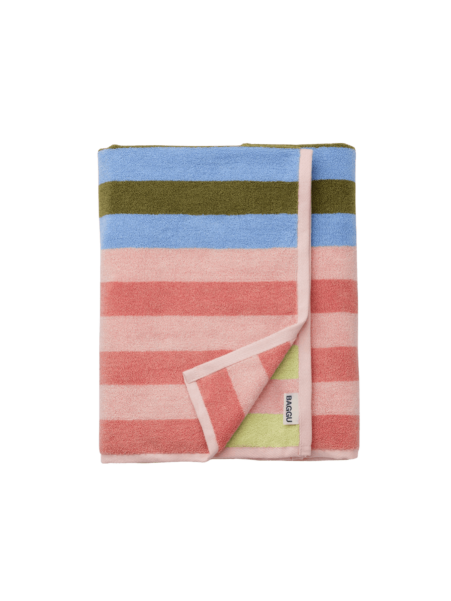 Folded view of the Baggu Bath Towel in Sherbet Stripe featuring plush terrycloth texture and pink, blue, and olive green striped sections | Twentyseven Toronto