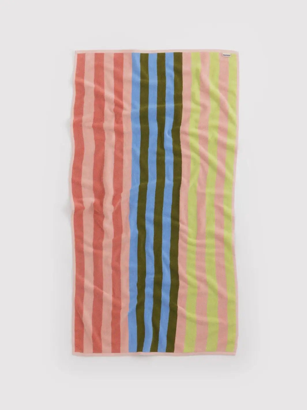 A full-length view of the Baggu Bath Towel in Sherbet Stripe laid flat, showcasing its vibrant vertical stripes in lime, pink, blue, and olive | Twentyseven Toronto