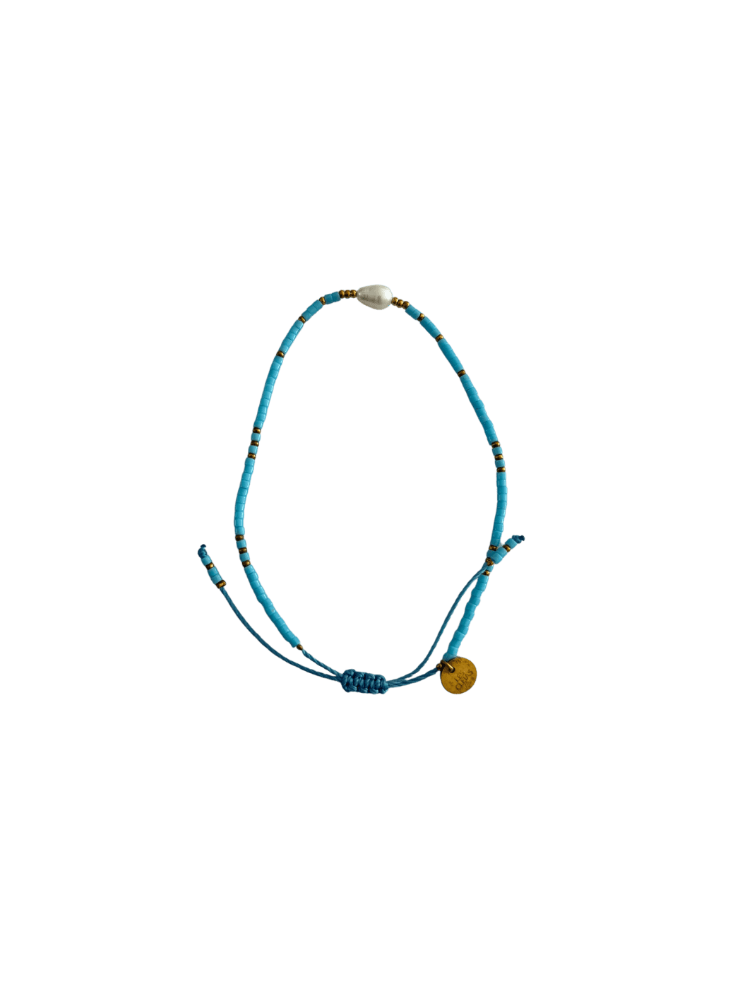 Bracelet with blue cord, small blue and gold beads and single white pearl with gold charm on a transparent background | Twentyseven Toronto