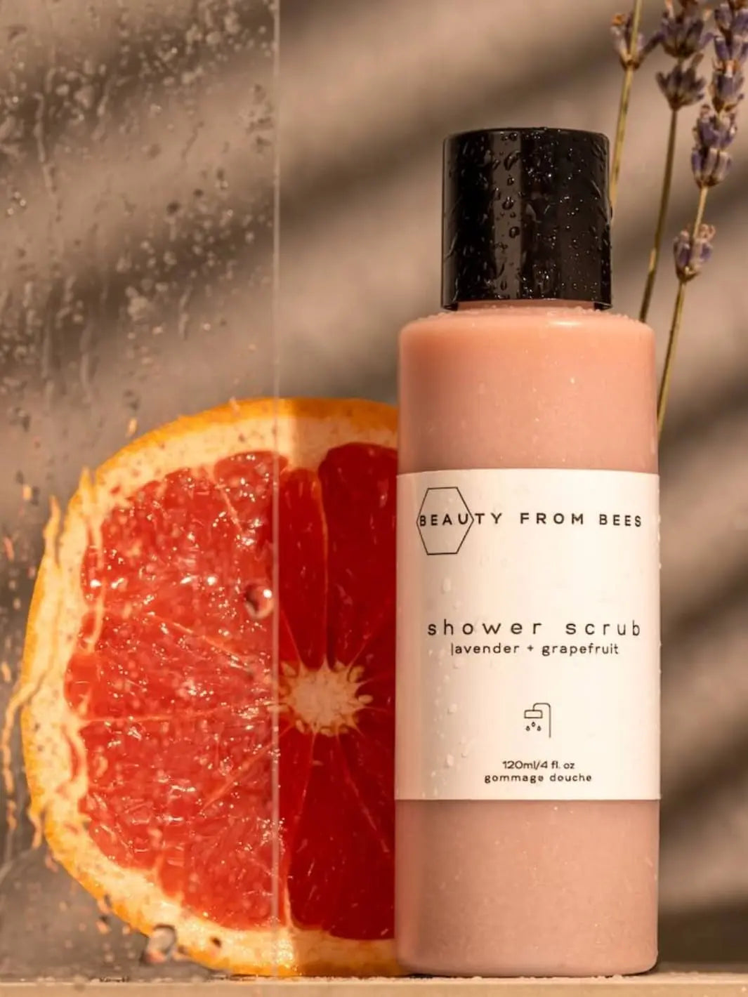 Beauty from Bees Shower Scrub | Twentyseven Toronto | Beauty from Bees Shower Scrub bottle with a grapefruit and lavender