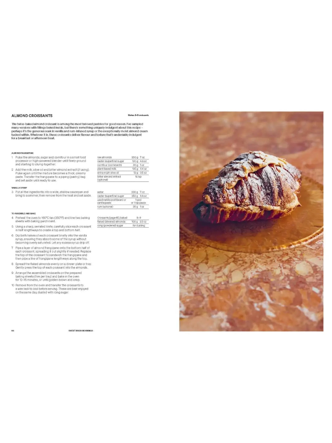 Recipe page for "Almond Croissants" from Beyond Baking: Plant-Based Baking for a New Era by Philip Khoury, featuring detailed instructions and an ingredient list on the left and a close-up photo of a golden, flaky almond croissant on the right | Twentyseven Toronto
