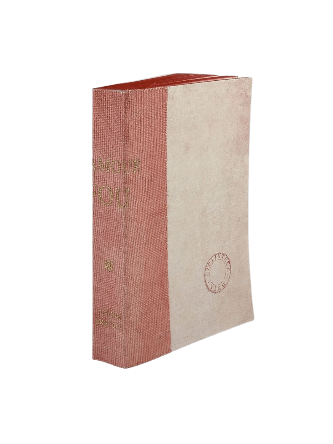 A notebook L'Amour Fou from the Slow Design Biblioteca Muta collection features a textured pink gauze spine stamped with gold literary typography alongside a pale, parchment-style cover bearing a circular library seal | Twentyseven Toronto