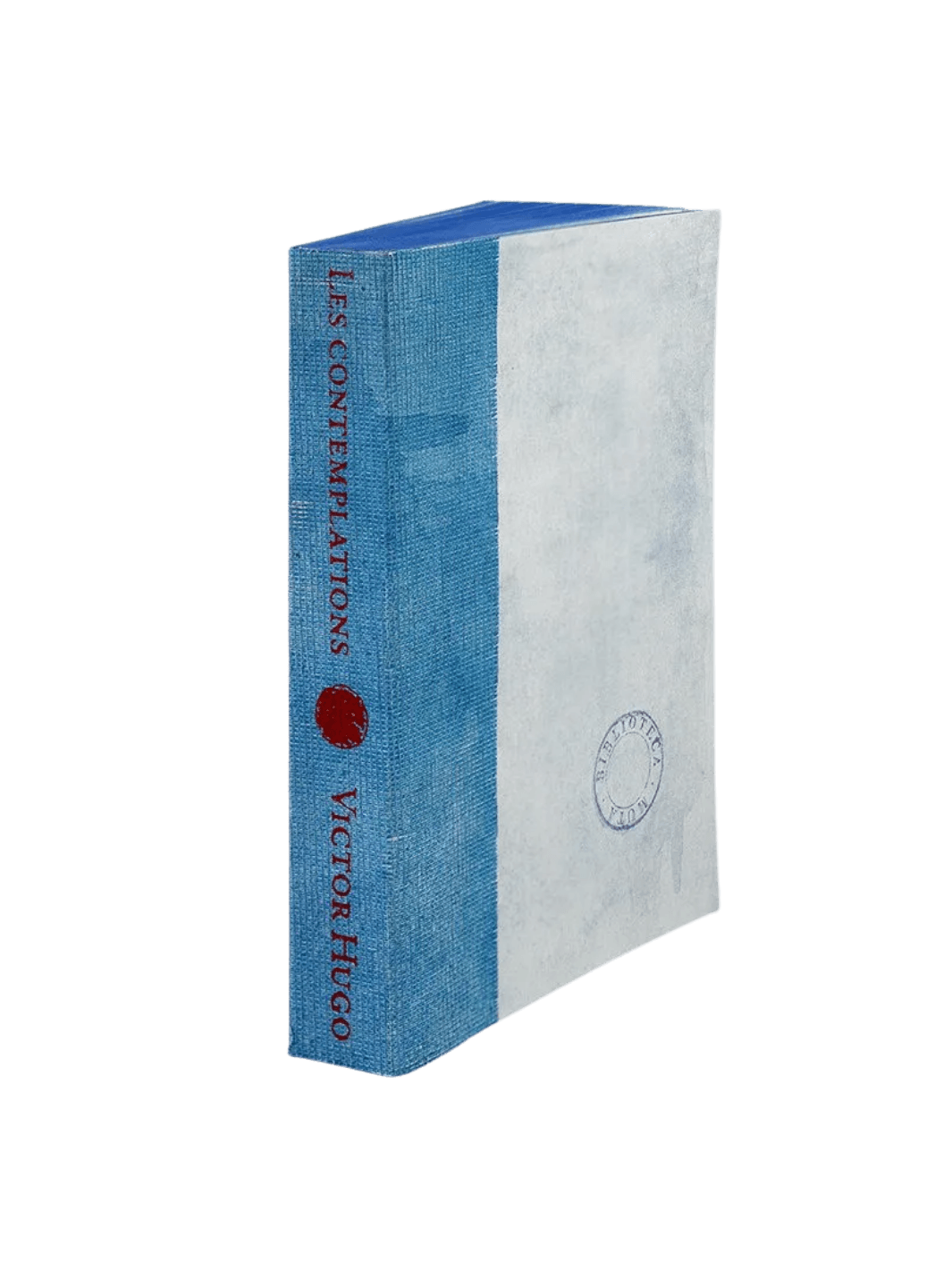 A notebook from the Les Contemplations from the Slow Design Biblioteca Muta collection features a textured light blue gauze spine stamped with red literary typography next to a pale cover bearing a circular library seal | Twentyseven Toronto