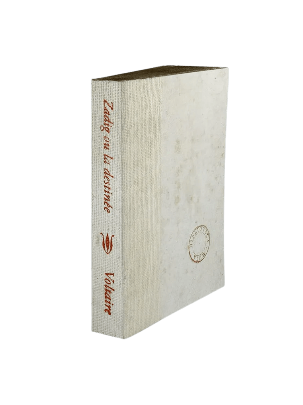 A notebook of Zadig ou la destinée from the Slow Design Biblioteca Muta collection features an off-white textured gauze spine stamped with elegant brown typography and a matching pale cover detailing a circular library seal | Twentyseven Toronto