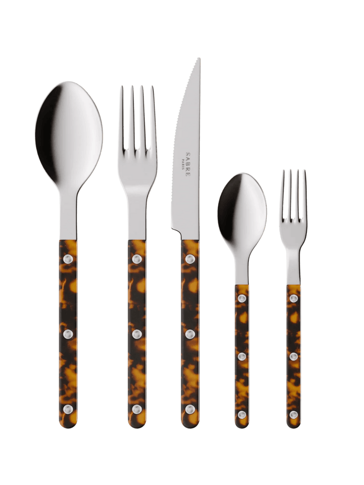 The complete Sabre Paris Bistrot Solid Shiny 5 Piece Cutlery Set in Faux Tortoise including a soup spoon, a dinner fork, a serrated dinner knife blade, a teaspoon and a small fork | Twentyseven Toronto