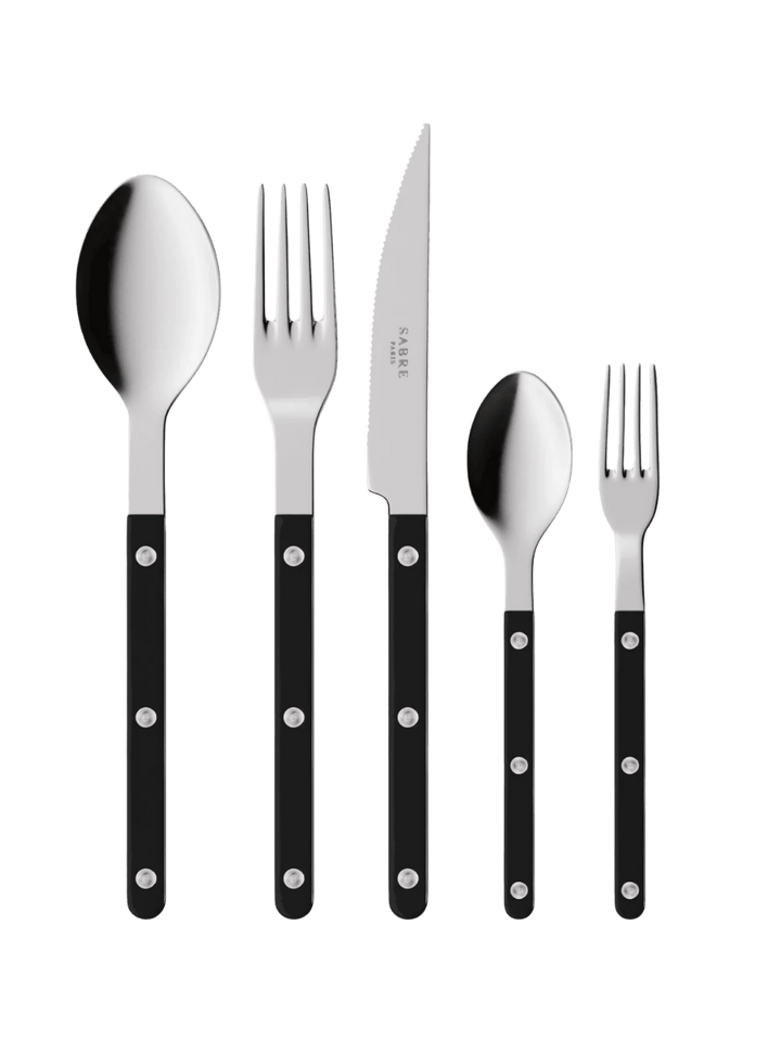 The complete Sabre Paris Bistrot Solid Shiny 5 Piece Cutlery Set in Black including a soup spoon, a dinner fork, a serrated dinner knife blade, a teaspoon and a small fork | Twentyseven Toronto