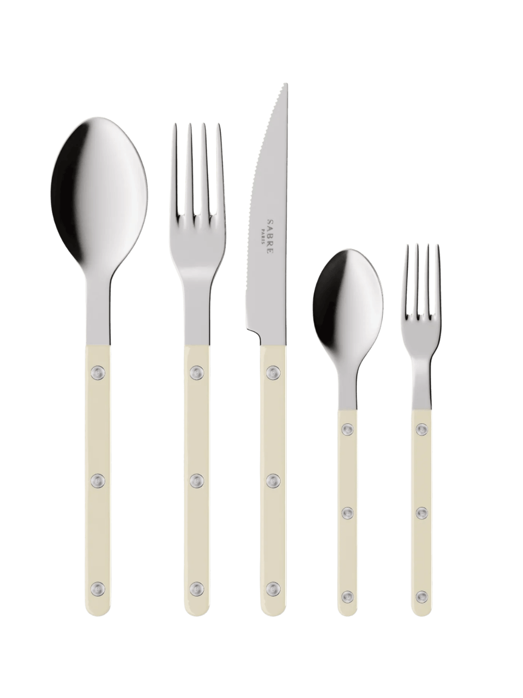 The complete Sabre Paris Bistrot Solid Shiny 5 Piece Cutlery Set in Ivory including a soup spoon, a dinner fork, a serrated dinner knife blade, a teaspoon and a small fork | Twentyseven Toronto