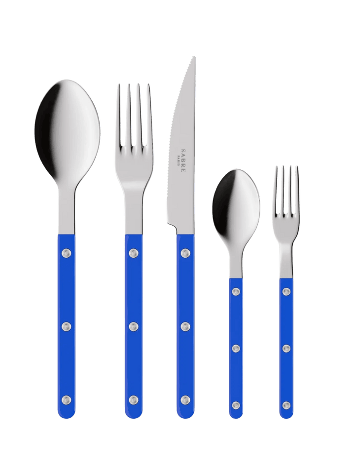 The complete Sabre Paris Bistrot Solid Shiny 5 Piece Cutlery Set in Lapis Blue including a soup spoon, a dinner fork, a serrated dinner knife blade, a teaspoon and a small fork | Twentyseven Toronto
