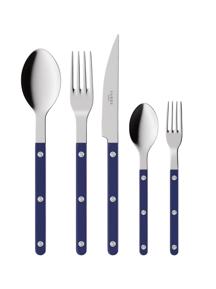 The complete Sabre Paris Bistrot Solid Shiny 5 Piece Cutlery Set in Navy Blue including a soup spoon, a dinner fork, a serrated dinner knife blade, a teaspoon and a small fork | Twentyseven Toronto
