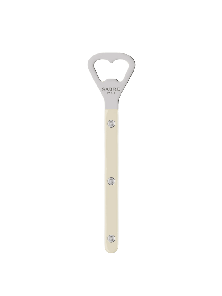 Sabre Paris Shiny Bistrot Solid Bottle Opener in Ivory displaying the "Sabre Paris" logo engraved on the stainless steel head | Twentyseven Toronto