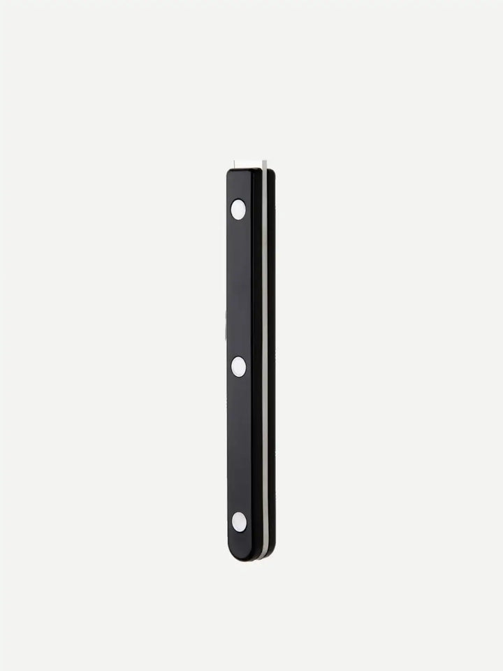 Side-view of the Sabre Paris Bistrot Solid Shiny Serving Set in Black handle highlighting the black finish and stainless steel rivets | Twentyseven Toronto