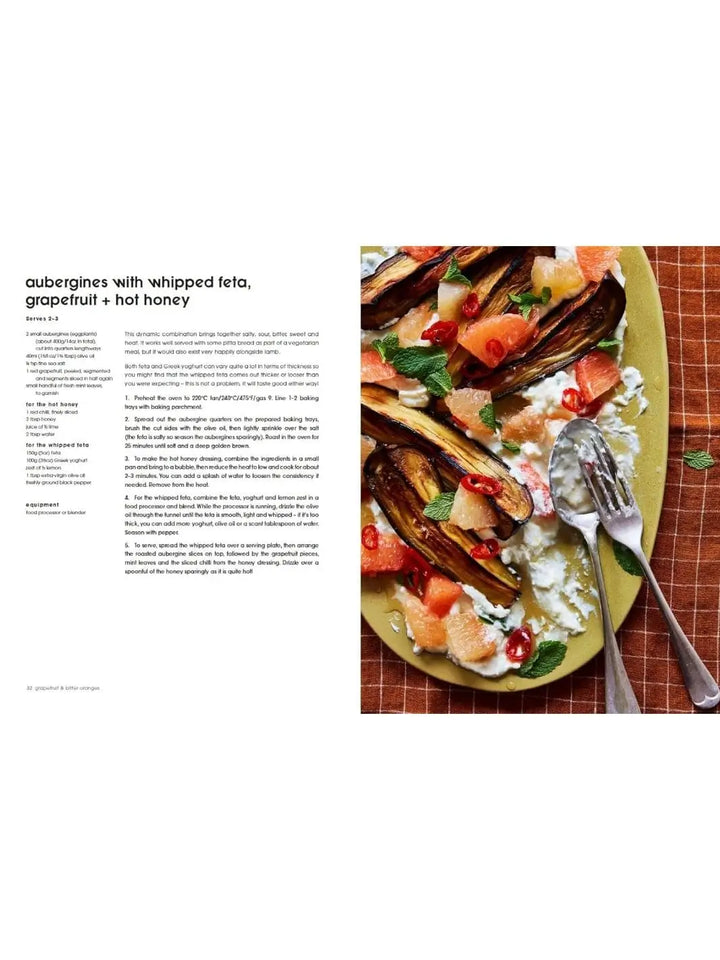 An open recipe page from "Bitter by Alexina Anatole" displays text for aubergines with whipped feta next to a vibrant platter of roasted eggplant slices topped with grapefruit segments, herbs, and chili | Twentyseven Toronto
